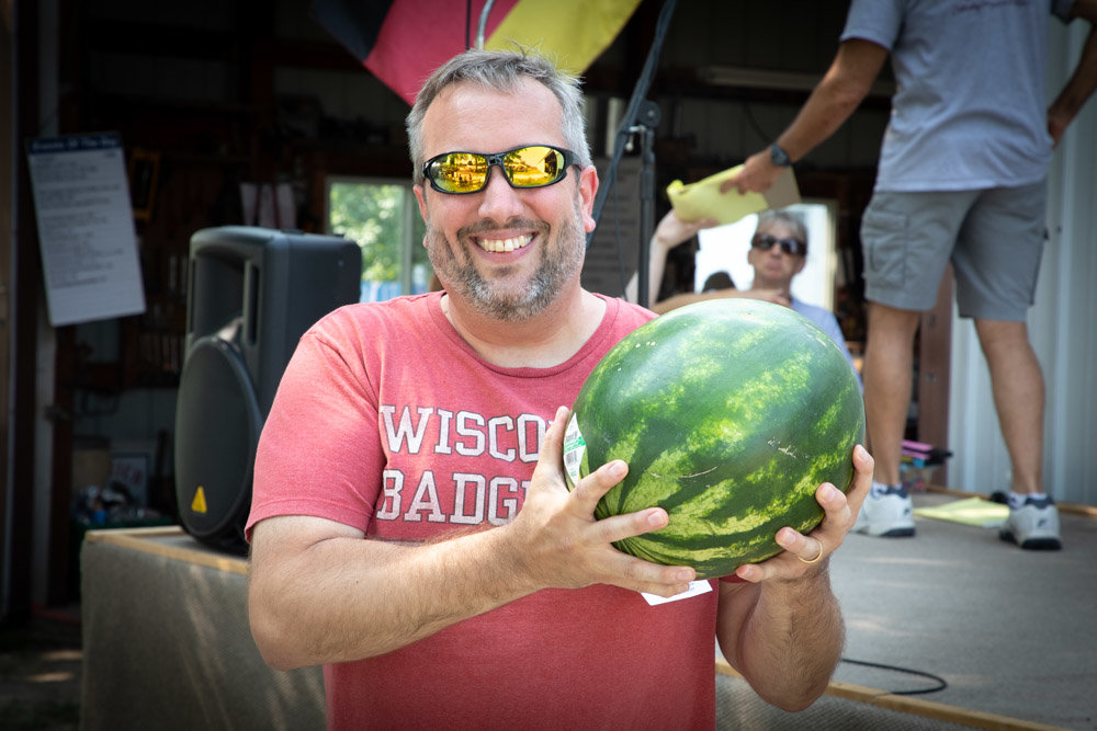 Chad wins the weight of the watermelon in ounces - 296 ounces